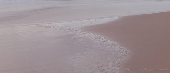 sunset and twilight beach scene, waves, sand, water