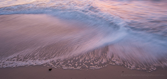 sunset and twilight beach scene, waves, sand, water