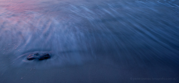 sunset and twilight beach scene, waves, sand, water